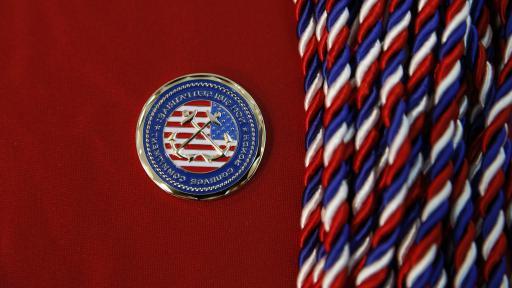 Cords 和 an emblem given to veterans upon graduation from North Central.